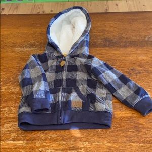 Sherpa hood, fleece lined jacket.
